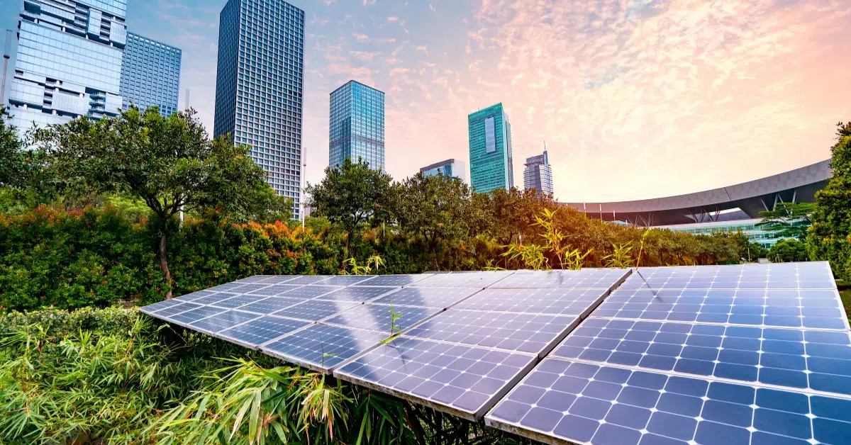 a city scape with a solar panel in the foreground - what residents needs to know about oklahoma solar incentives